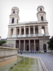 Igreja Saint-Sulpice - Vista da fachada principal da igreja da Praça Saint-Sulpice com uma fonte