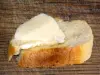 Isigny的乳制品 - 黄油片断在面包片的