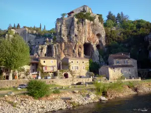 Labeaume - View of the houses along the Baume river and limestone cliffs of the Balm gorges