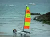 Landscapes of the Brittany coast - Emerald Coast: catamaran, sandy beach, rock, boats on the sea, in Saint-Lunaire