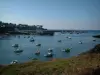 Landscapes of the Brittany coast - Fishing port with its sailboats, ships and boats, then village in background