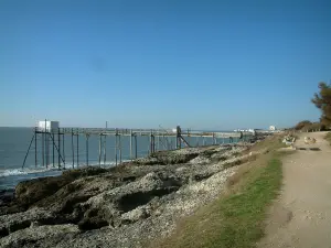 Landscapes of the Charente-Maritime coast - Footpath, cliffs, fishermen's huts built on stilts and sea