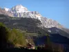 Landscapes of the Hautes-Alpes - Dévoluy mountain range: houses, trees and mountain