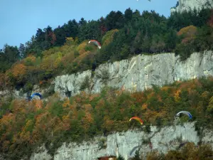 Landscapes of the Savoie in automn - Paraglides, cliff and trees in autumn