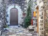 Mirabel - Entrances of stone houses