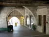 Monflanquin - Medieval bastide town: under the arcades