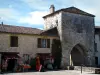 Monpazier - Puerta fortificada, casas de la tienda y la casa de campo en Périgord
