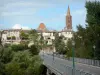 Montricoux - Bridge spanning River Aveyron with views of the bell tower (Toulouse-style) of the Saint-Pierre church and the houses of the village