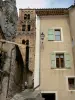 Moustiers-Sainte-Marie - Bell tower of the Notre-Dame-de-l'Assomption church, stair and houses of the village