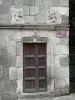 Murat - Door of the consular house surmounted by two carved angels