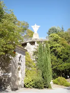 Notre-Dame d'Aiguebelle Abbey - Statue of Christ surrounded by trees