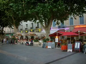 Orange - Square with cafe terraces, restaurants, and houses