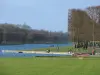 Park of the Palace of Versailles - Grand Canal, lawns and trimmed trees