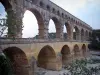 Pont du Gard bridge - Arcades (arches) of the Roman aqueduct (ancient monument); in the town of Vers-Pont-du-Gard