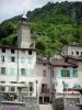 Pont-en-Royans - Clock tower, facades of houses, lampposts and café terrace (town in the Vercors Regional Nature Park)