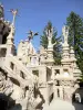 Postman Cheval's Ideal Palace - Sculptures in the shape of trees and animal heads