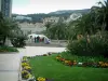 Principauté de Monaco - Parc de Monte-Carlo avec plantes exotiques, fleurs et fontaine en arrière-plan