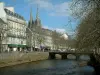 Quimper - Odet River, with small bridge and quaysides, lined with beautiful buildings, then top of the cathedral in background