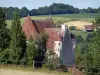 Regionaal Natuurpark van Perche - Courboyer herenhuizen het Huis van Regionaal Natuurpark van Perche (over de gemeente van de Noce), bomen en weiden