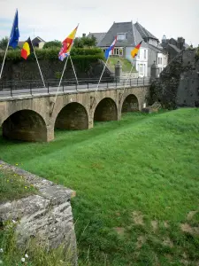 Rocroi - France gate, rampart, bridge with flags and houses of the fortified town