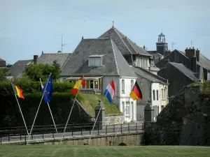 Rocroi - France bridge with flags and houses of the fortified town