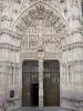 Rue - carved facade (statuary, sculptures) of the Saint-Esprit chapel of Flamboyant Gothic style