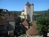 Saint-Cirq-Lapopie - Kerk, kasteelruïnes en dorpshuizen in de vallei van de Lot in de Quercy