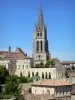 Saint-Émilion - Bell tower of the monolithic church and facades of the medieval town 