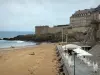 Saint-Malo - Sandy beach, café terrace, cliffs, bastion, ramparts and buildings of the malouine corsair town 