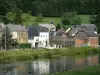 Semoy valley - Facades of houses in the village of les Hautes-Rivières along River Semoy; in the Ardennes Regional Nature Park