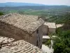 Simiane-la-Rotonde - View of the roofs of the village and surrounding hills