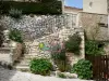 Simiane-la-Rotonde - Stone walls bordering the stair of a house