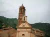 Speloncato - Kerk en dorpshuizen, heuvels op de achtergrond (in Balagne)