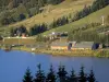 Super Besse - Hermines lake and lifts of the ski resort (winter sports); in the Auvergne Volcanic Regional Nature Park, in the Massif du Sancy mountains (Monts Dore), in Besse-et-Saint-Anastaise