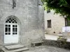 Treignac - Facades of the Notre-Dame-de-la-Paix and City Hall