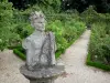 Val-de-Marne的玫瑰园 - 玫瑰丛中间的雕像