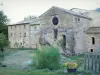 Valcroissant Abbey - Facades of old convent buildings surrounded by greenery, in the Vercors Regional Nature Park