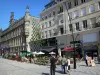 Valenciennes - Town hall, building and café terraces of the Armes square