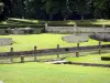 Villarceaux estate - Water basin and boxwood embroideries in the garden on the water (parterre on the water), and pruned trees