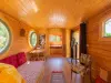 Natura-Lodge - Roulotte en bois avec coin salon et chambre séparée